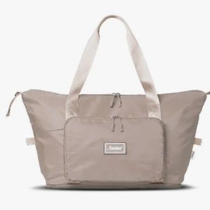 The Foldie bag . Color is a light beige. NWT